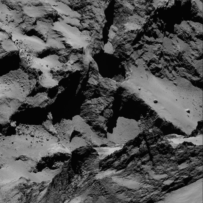 Illustration for article titled Rosetta explica el origen de los enormes agujeros sobre el cometa 67/P